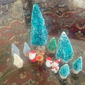 Set of brush trees and celluloid figures. Santa snowmen reindeer